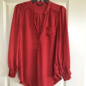 Rust-colored longsleeve top